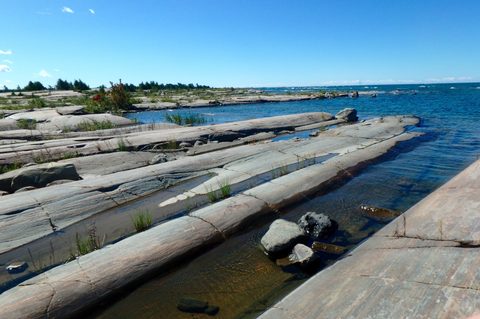 Photo from Paddling Painted - Kayaking out of Bayfield Inlet.