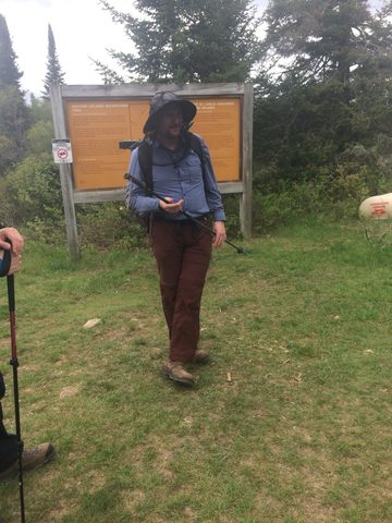Tim, demonstrating the correct posture to assume while waiting in the thunder-box line-up