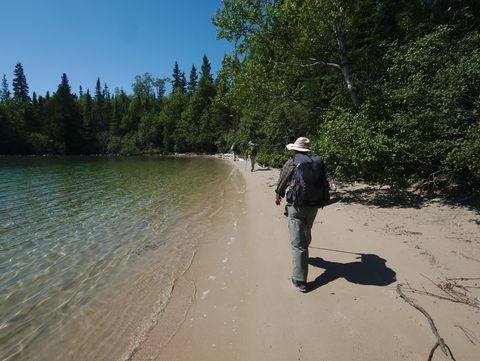 Beautiful sandy beaches. The water was high, but warm. Well, warm for Lake Superior. Dino photo