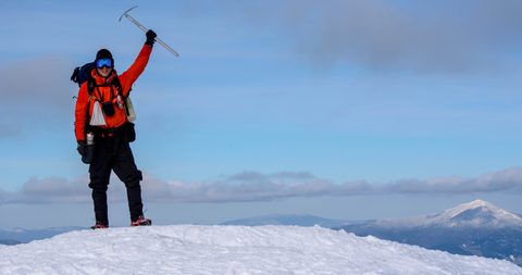 Ryan on the summit of Algonquin Peak with Whiteface Mountain in the background