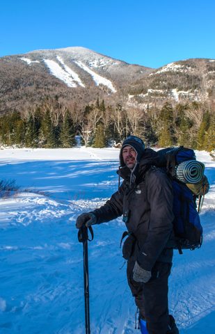 Robin at Marcy Dam with Wright Peak towering above